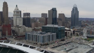 DX0001_002672 - 5.7K aerial stock footage fly away from apartment and office buildings near tall skyscrapers in Downtown Cincinnati, Ohio