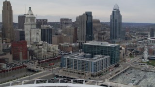 5.7K aerial stock footage flyby apartment and office buildings near tall skyscrapers in Downtown Cincinnati, Ohio Aerial Stock Footage | DX0001_002675