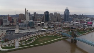 5.7K aerial stock footage flyby the city's skyline, seen from a bridge over the Ohio River in Downtown Cincinnati, Ohio Aerial Stock Footage | DX0001_002684