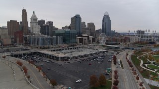 5.7K aerial stock footage descent near parking lot with view of the city's skyline in Downtown Cincinnati, Ohio Aerial Stock Footage | DX0001_002692