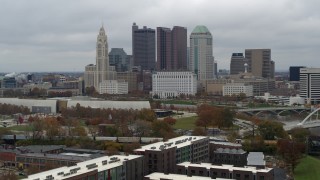 5.7K aerial stock footage slowly fly away from the city's skyline and the Scioto River in Downtown Columbus, Ohio Aerial Stock Footage | DX0001_002701