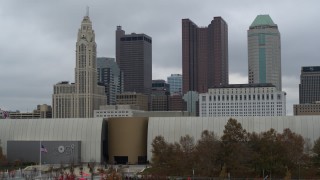 5.7K aerial stock footage ascend from museum to view the city's skyline in Downtown Columbus, Ohio Aerial Stock Footage | DX0001_002702