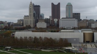 5.7K aerial stock footage ascend over science museum, with city's skyline behind it, reveal river, Downtown Columbus, Ohio Aerial Stock Footage | DX0001_002728