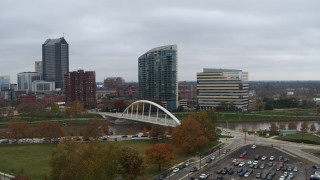 5.7K aerial stock footage riverfront condo complex and office building by bridge and river, Downtown Columbus, Ohio Aerial Stock Footage | DX0001_002734