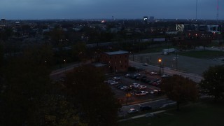 5.7K aerial stock footage of approaching a brick police station at twilight in Columbus, Ohio Aerial Stock Footage | DX0001_002764