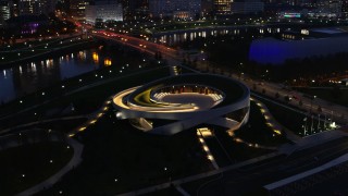 DX0001_002779 - 5.7K aerial stock footage of orbiting the Veterans Memorial Auditorium at twilight in Columbus, Ohio