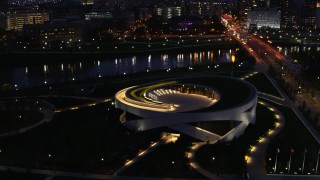 DX0001_002781 - 5.7K aerial stock footage of approaching the Veterans Memorial Auditorium at twilight in Columbus, Ohio