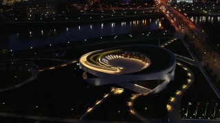 DX0001_002782 - 5.7K aerial stock footage of a stationary view of the Veterans Memorial Auditorium at twilight in Columbus, Ohio