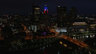 5.7K aerial stock footage of flying by LeVeque Tower and city skyline at night, Downtown Columbus, Ohio Aerial Stock Footage | DX0001_002797