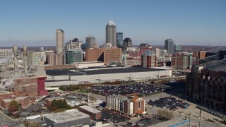 5.7K aerial stock footage flyby brick factory and convention center, focus on city skyline, Downtown Indianapolis, Indiana Aerial Stock Footage | DX0001_002806