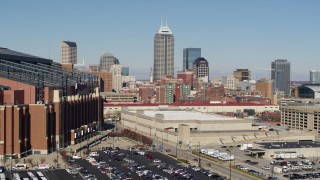 5.7K aerial stock footage of flying by the city's skyline, reveal the football stadium in Downtown Indianapolis, Indiana Aerial Stock Footage | DX0001_002823