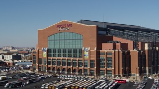 5.7K aerial stock footage orbiting the front of a football stadium in Indianapolis, Indiana Aerial Stock Footage | DX0001_002832