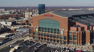 5.7K aerial stock footage of ascending in front of a football stadium in Indianapolis, Indiana Aerial Stock Footage | DX0001_002835