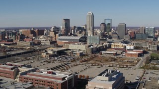 DX0001_002841 - 5.7K aerial stock footage descend and then approach the city's skyline in Downtown Indianapolis, Indiana