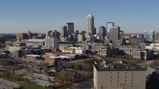 5.7K aerial stock footage descend and then approach the city's skyline in Downtown Indianapolis, Indiana Aerial Stock Footage | DX0001_002848