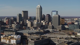 5.7K aerial stock footage of a reverse view of tall skyscrapers in the city's skyline in Downtown Indianapolis, Indiana Aerial Stock Footage | DX0001_002857