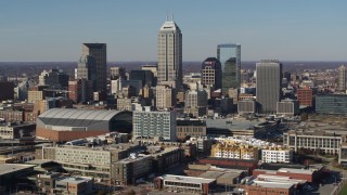 5.7K aerial stock footage of slowly approaching tall skyscrapers in the city's skyline in Downtown Indianapolis, Indiana Aerial Stock Footage | DX0001_002859