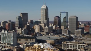 DX0001_002861 - 5.7K aerial stock footage of slow flyby of tall skyscrapers in the city's skyline in Downtown Indianapolis, Indiana