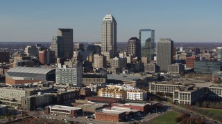 5.7K aerial stock footage of flying by towering skyscrapers in the city's skyline in Downtown Indianapolis, Indiana Aerial Stock Footage | DX0001_002864