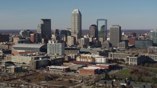 5.7K aerial stock footage descend with view of towering skyscrapers in the city's skyline in Downtown Indianapolis, Indiana Aerial Stock Footage | DX0001_002865