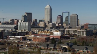 5.7K aerial stock footage descend with a view of the towering skyscrapers in the city's skyline in Downtown Indianapolis, Indiana Aerial Stock Footage | DX0001_002866