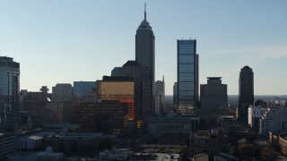 5.7K aerial stock footage descend and flyby the towering skyscrapers in the city's skyline in Downtown Indianapolis, Indiana Aerial Stock Footage | DX0001_002869