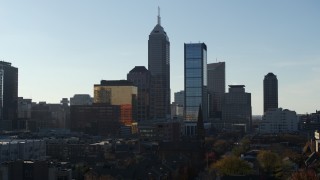 5.7K aerial stock footage a view of the towering skyscrapers in the city's skyline during descent in Downtown Indianapolis, Indiana Aerial Stock Footage | DX0001_002874