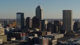 5.7K aerial stock footage of approaching by the skyline of Downtown Indianapolis, Indiana Aerial Stock Footage | DX0001_002879