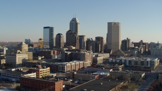 DX0001_002890 - 5.7K aerial stock footage ascend with view of skyline in Downtown Indianapolis, Indiana