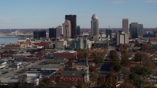 5.7K aerial stock footage a reverse view of skyscrapers in the city's skyline in Downtown Louisville, Kentucky Aerial Stock Footage | DX0001_002989