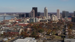 DX0001_002991 - 5.7K aerial stock footage of passing by skyscrapers in the city's skyline in Downtown Louisville, Kentucky