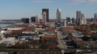 5.7K aerial stock footage descend and focus on skyscrapers in the city's skyline in Downtown Louisville, Kentucky Aerial Stock Footage | DX0001_002993