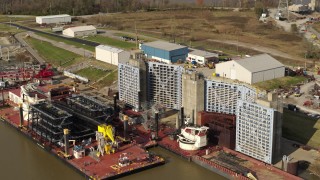 5.7K aerial stock footage flyby and away from piers on the Ohio River in Louisville, Kentucky Aerial Stock Footage | DX0001_003011