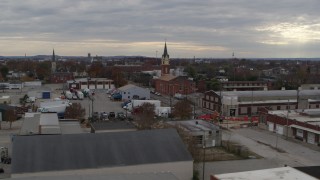 5.7K aerial stock footage of a small church and steeple in an industrial area, Louisville, Kentucky Aerial Stock Footage | DX0001_003036