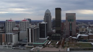 5.7K aerial stock footage reverse view of riverfront hotel and the city skyline, reveal the river in Downtown Louisville, Kentucky Aerial Stock Footage | DX0001_003044