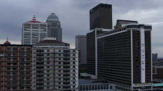 DX0001_003057 - 5.7K aerial stock footage flyby hotel and skyscrapers in Downtown Louisville, Kentucky