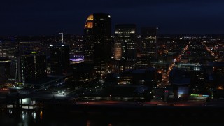 5.7K aerial stock footage flying by the city's skyline at twilight, Downtown Louisville, Kentucky Aerial Stock Footage | DX0001_003122