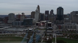 5.7K aerial stock footage reverse view of city's skyline, reveal the bridge and river, Downtown Cincinnati, Ohio Aerial Stock Footage | DX0001_003135