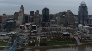 5.7K aerial stock footage slow approach to city skyline and Scripps Center from the Ohio River, Downtown Cincinnati, Ohio Aerial Stock Footage | DX0001_003146