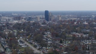 5.7K aerial stock footage of city skyline while flying by neighborhoods, Downtown Lexington, Kentucky Aerial Stock Footage | DX0001_003228