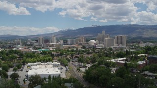 5.7K aerial stock footage of hotels and casinos seen while passing north of the city in Reno, Nevada Aerial Stock Footage | DX0001_004_024