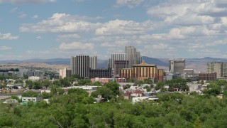 5.7K aerial stock footage of flying by a group of hotels and casino resorts in Reno, Nevada Aerial Stock Footage | DX0001_004_058