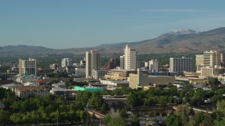 5.7K aerial stock footage of flying by high-rise casino resorts in Reno, Nevada Aerial Stock Footage | DX0001_006_004