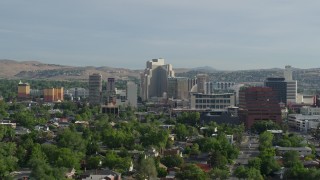 5.7K aerial stock footage of casino resorts and office buildings seen from neighborhoods in Reno, Nevada Aerial Stock Footage | DX0001_006_015