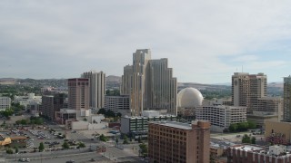 DX0001_006_030 - 5.7K aerial stock footage of flying toward the Silver Legacy Resort in Reno, Nevada