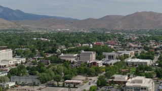 DX0001_007_003 - 5.7K aerial stock footage flyby the Nevada State Capitol dome and other government buildings in Carson City, Nevada