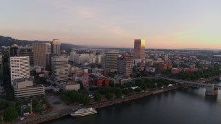 4K aerial stock footage flying over Hawthorne Bridge toward Morrison Bridge, Downtown Portland, Oregon Aerial Stock Footage | DX0001_010_010