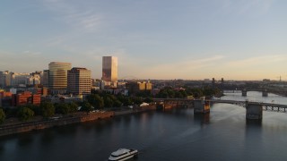 DX0001_010_019 - 4K aerial stock footage approaching the Morrison Bridge spanning Willamette River near Downtown Portland, Oregon