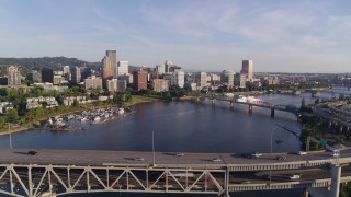 4K aerial stock footage flying away from downtown and over the Marquam Bridge, I-5, Downtown Portland, Oregon Aerial Stock Footage | DX0001_010_039