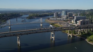 5.7K aerial stock footage of the Marquam Bridge (I-5) spanning the Willamette River, South Portland, Oregon Aerial Stock Footage | DX0001_011_005